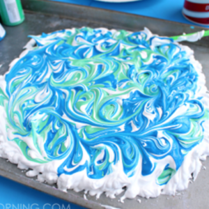 White cake with blue and green swirls