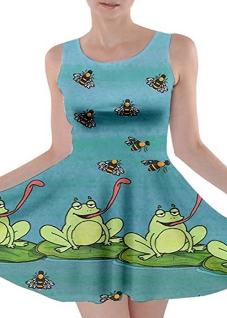 Cute teacher outfit: Woman in a frog print dress